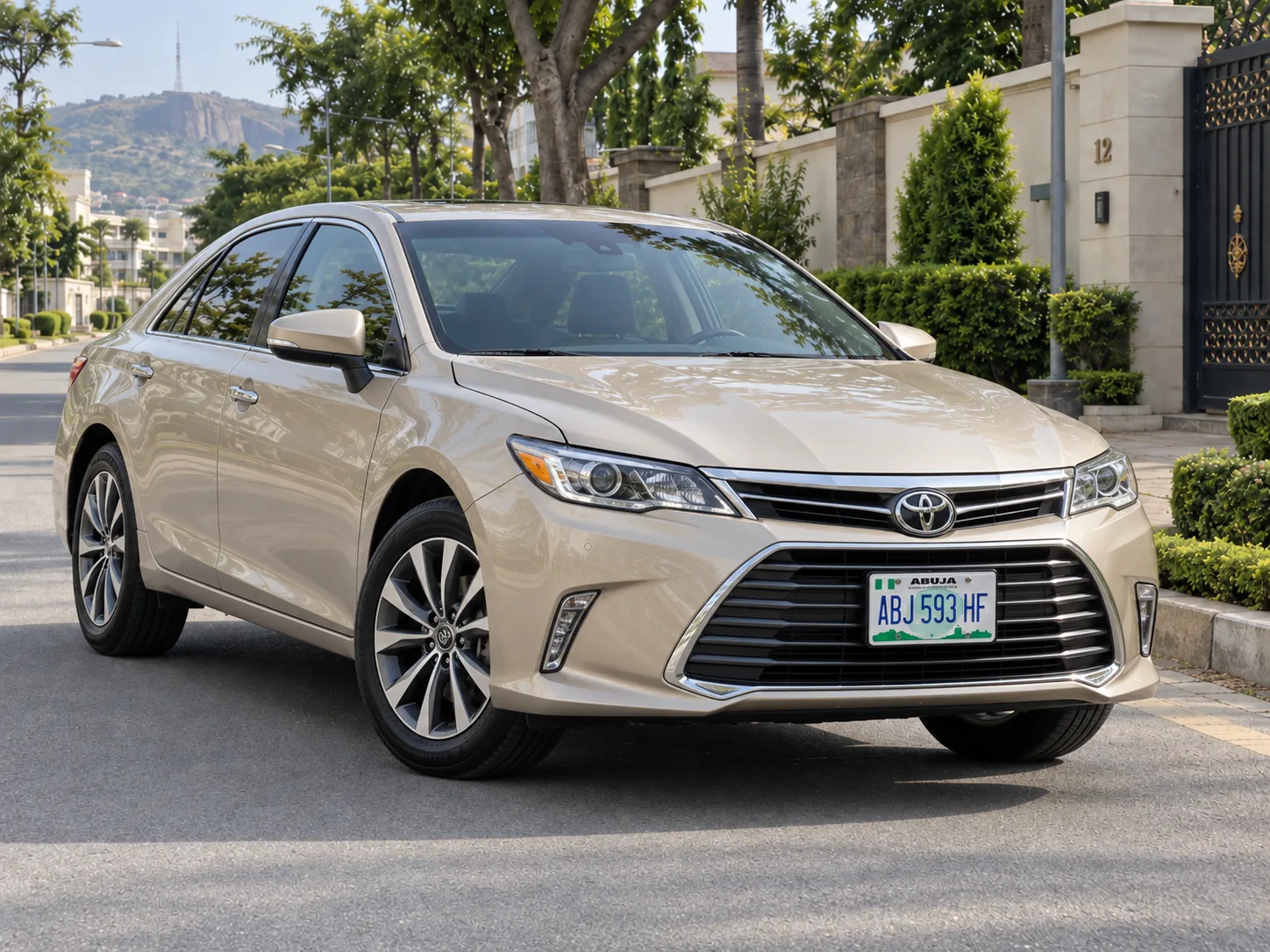 Gold Toyota Avalon 2017 self drive rental Abuja