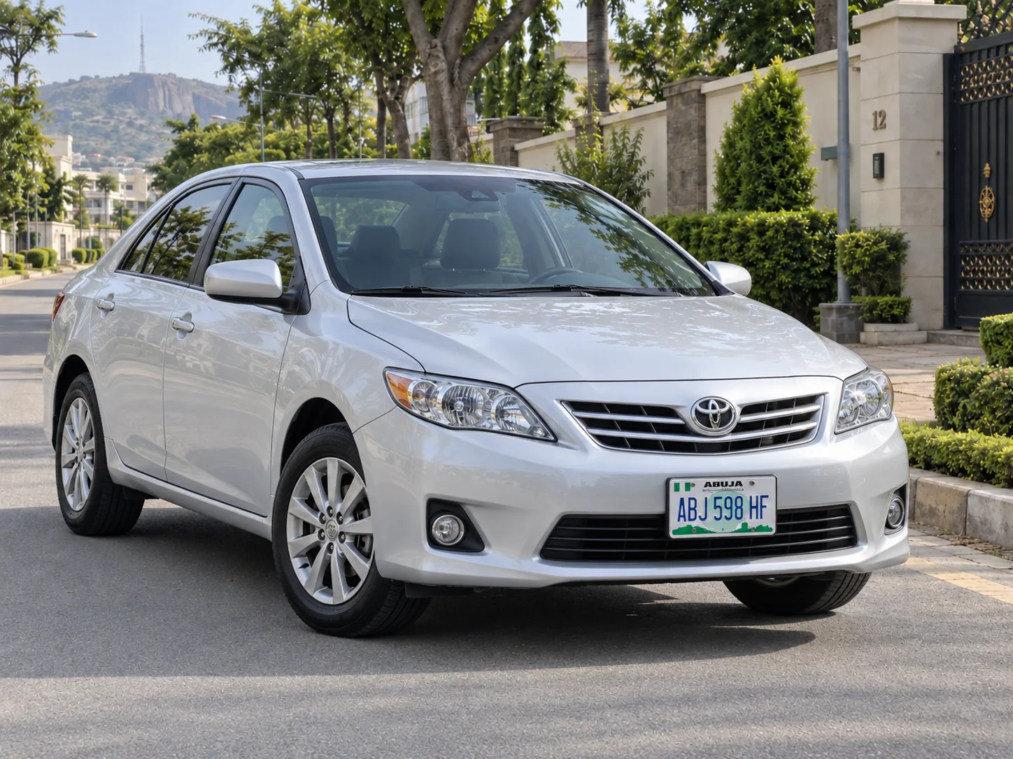 Silver Toyota Corolla 2012 self drive rental Abuja